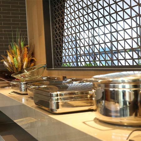 Chaoyang  Qiu Guo Hotel Hua Mao מראה חיצוני תמונה